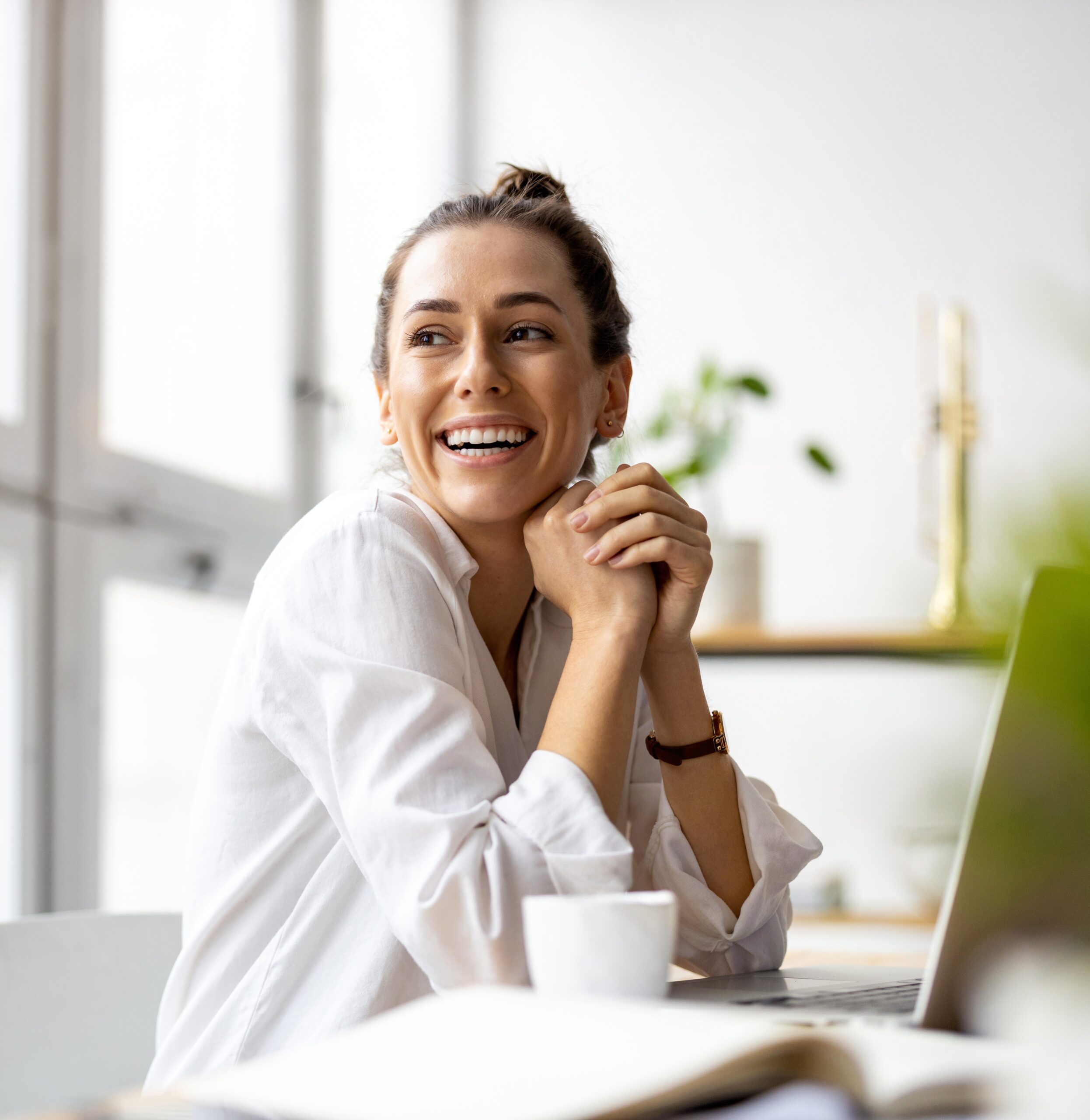business women smiling working on computer