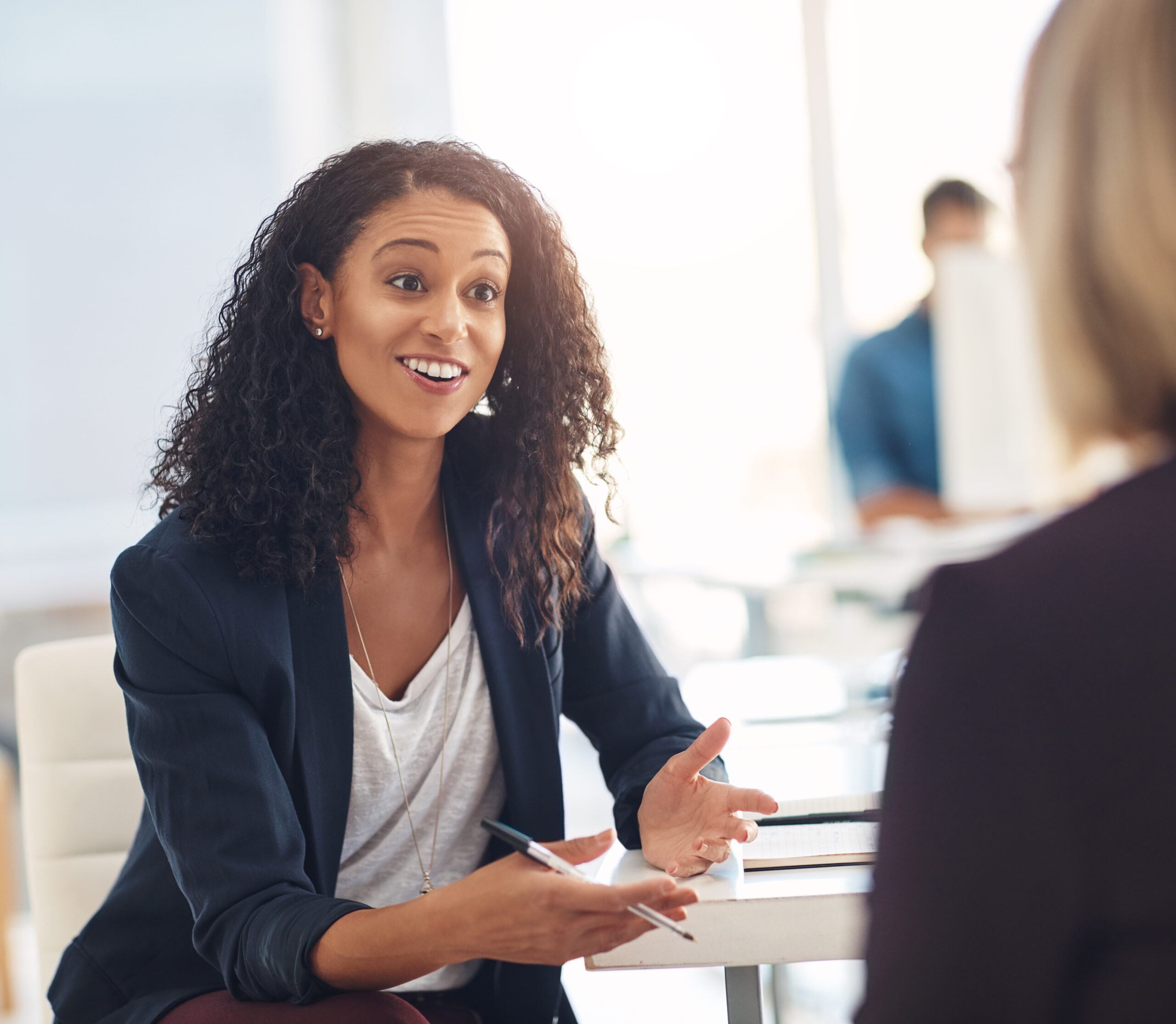 young black women talking with a bank client