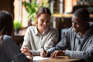 Maryland Couple Signing FHA Loan